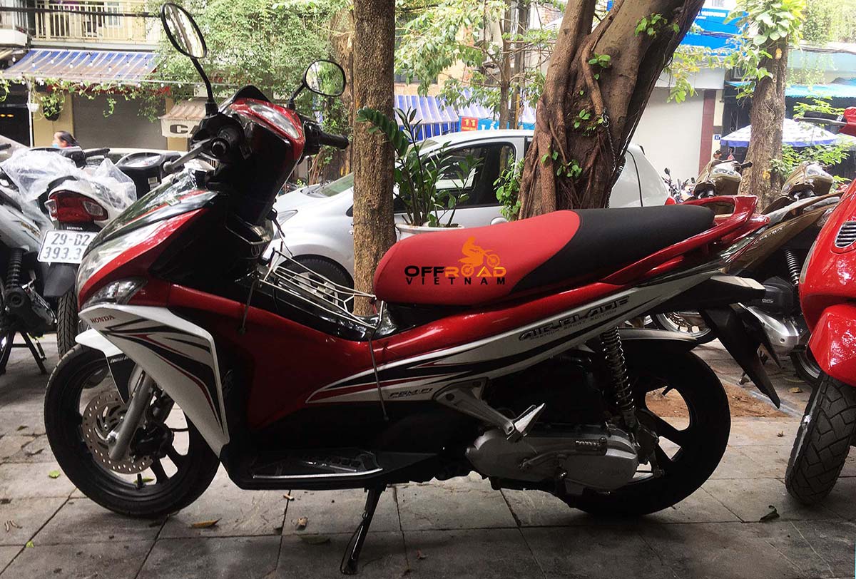 Offroad Vietnam offers automatic Honda Air Blade 110cc scooter in Hanoi, shot from the left.