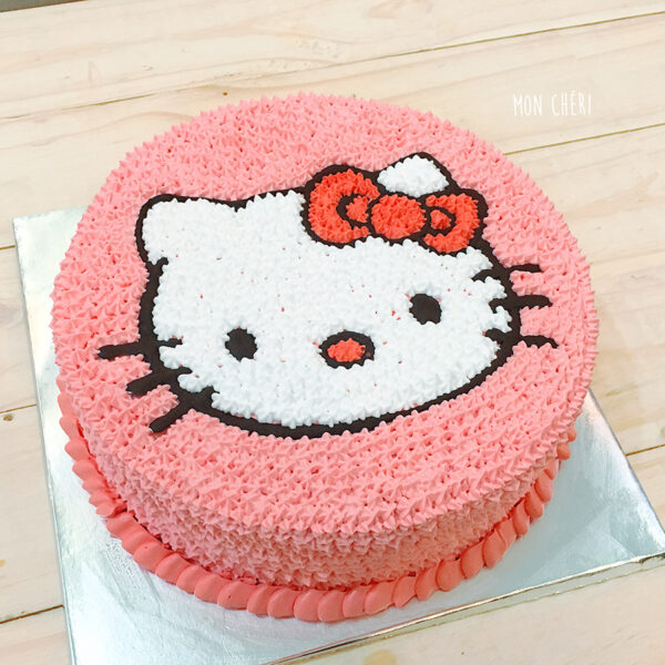 hình ảnh hello kitty với chiếc nơ màu hồng trên cánh kem