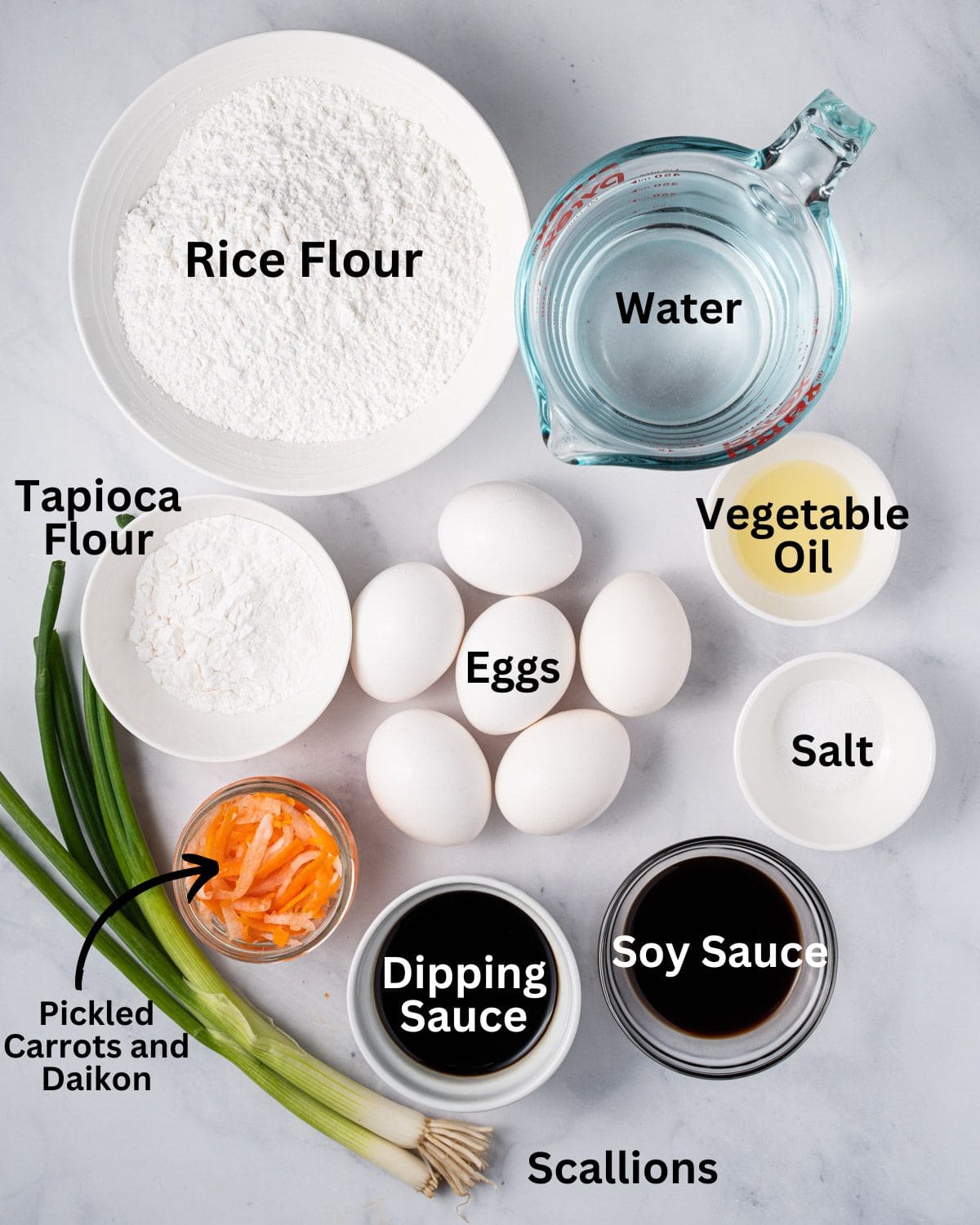 Ingredients needed for bot chien: rice flour, tapioca flour, water, salt, eggs, soy sauce, dipping sauce, pickled carrots and daikon, and scallions.