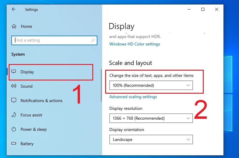 Đổi Change the size of text, apps, and other items về mức 100%