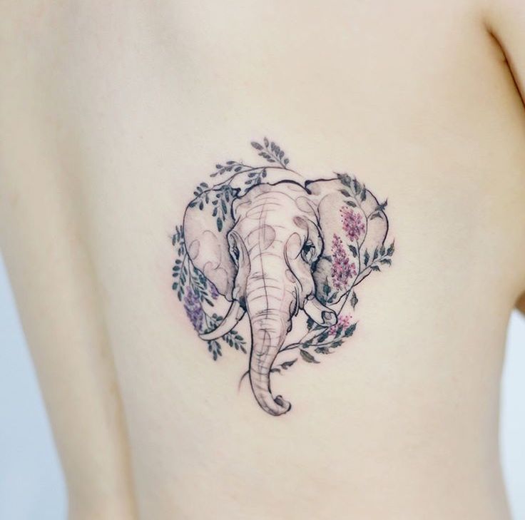 nghệ thuật tattoo lưng mẫu xăm voi hoa lá