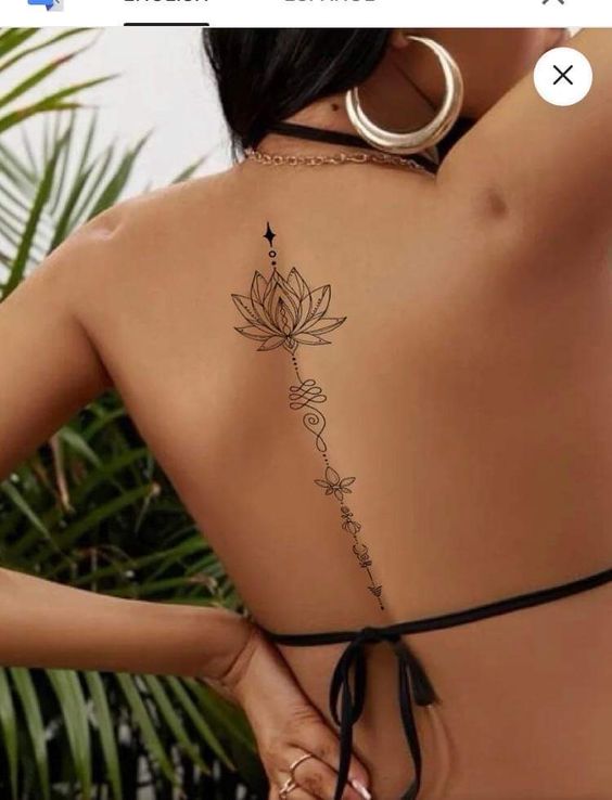 mẫu tattoo sen đẹp dọc sống lưng cho nữ đơn giản