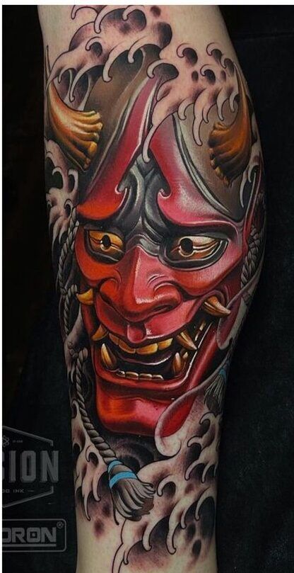 tattoo mặt quỷ satan bắp chân