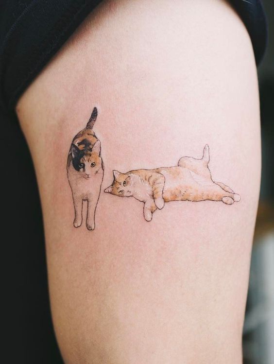 mẫu tattoo mèo cực sinh động trên đùi