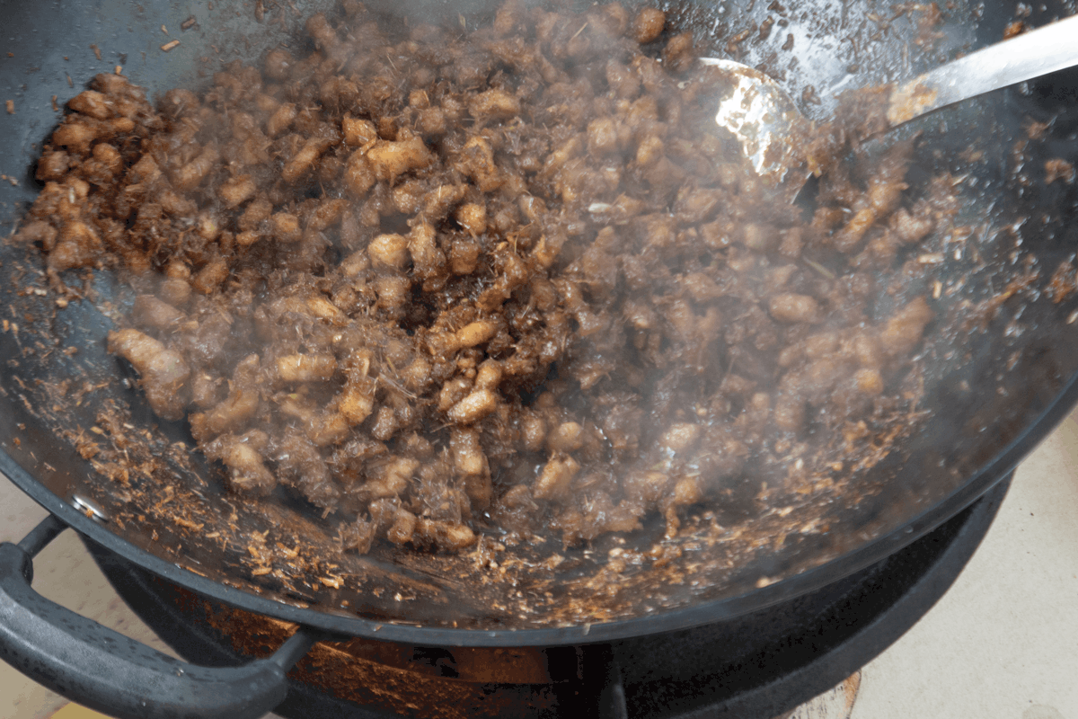 Thịt Kho Mắm Ruốc in a wok.