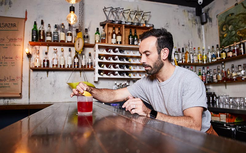 Bartender making a well drink