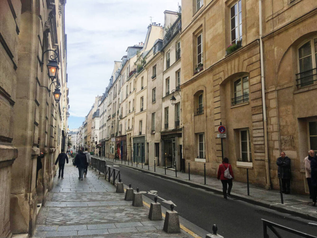 View of people passing by the Rue des Tournelles